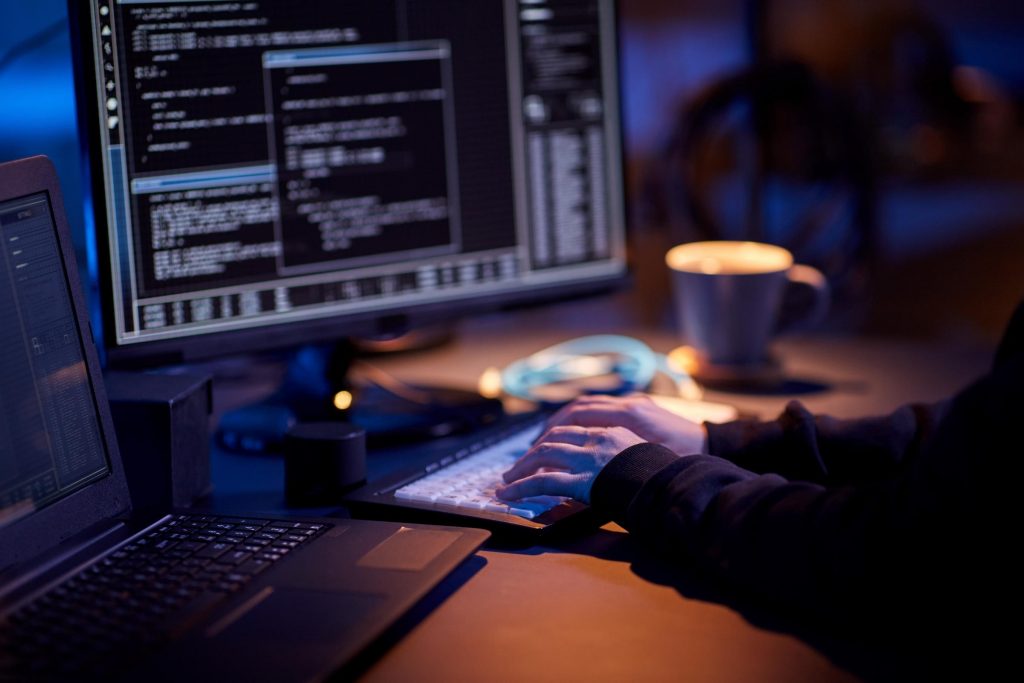 A hacker try to hacking with cyberattacks.
